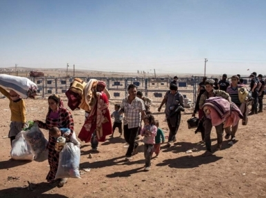 UN concerned over safety of civilians as ISIL intensifies offensive in Syrian border town