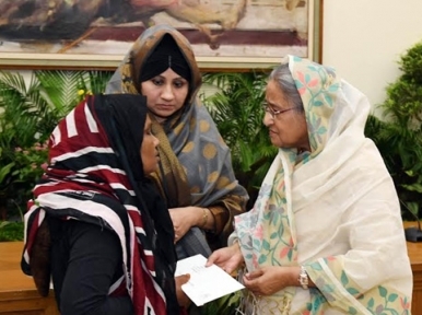 Hasina expresses grief over death of two students 