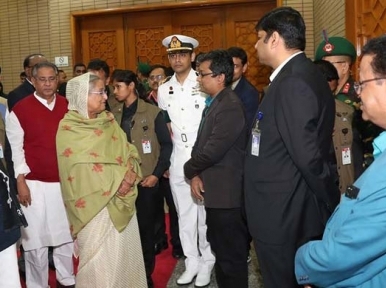 PM Hasina stands beside Bhaduri
