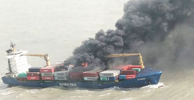 Ship on fire anchored by Indian Navy