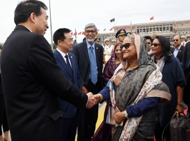 Sheikh Hasina returns home after China visit 