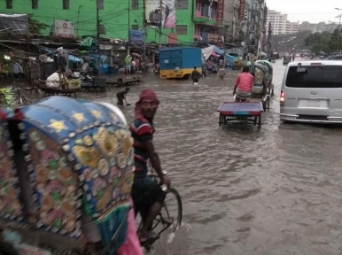 Dhaka: Rain hits normal life 