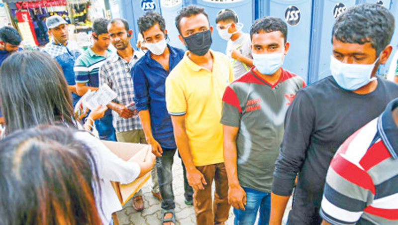 Bangladeshis return from Kuwait camp