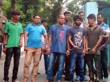 RAB officials nab 12 robbers from Dhaka