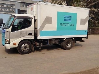 Covid-19 vaccines transported in freezer vans