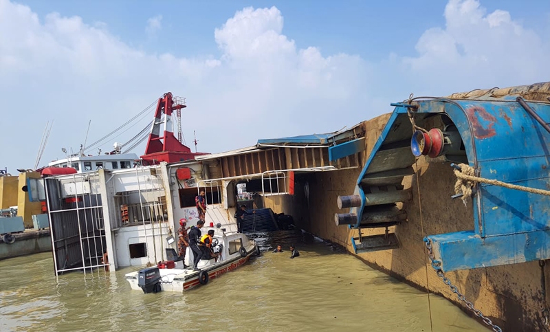 Ferry with 17 trucks overturns in Paturia