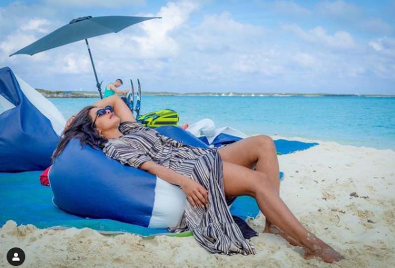 Priyanka Chopra Jonas relaxes on beach, shares throwback image on Instagram Priyanka Chopra Jonas relaxes on beach, shares throwback image on Instagram