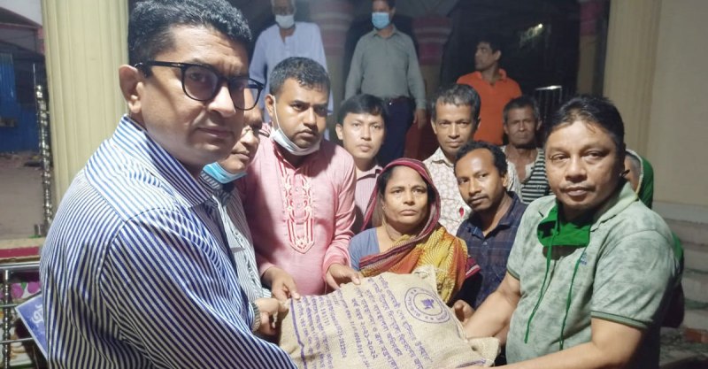 500 affected Hindu devotees receive aid from Prime Minister Hasina in Noakhali