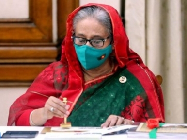 Prime Minister Hasina releases a commemorative stamp on Independence Day