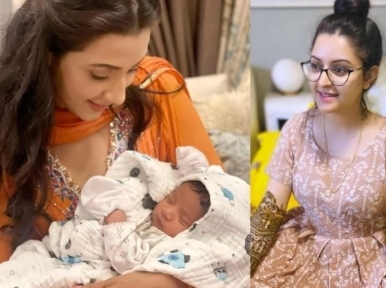 Actress Bidya Sinha Mim meets Pori Moni's newborn son