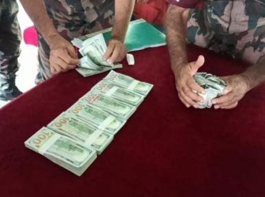 USD 80,000 seized from border while being smuggled to India