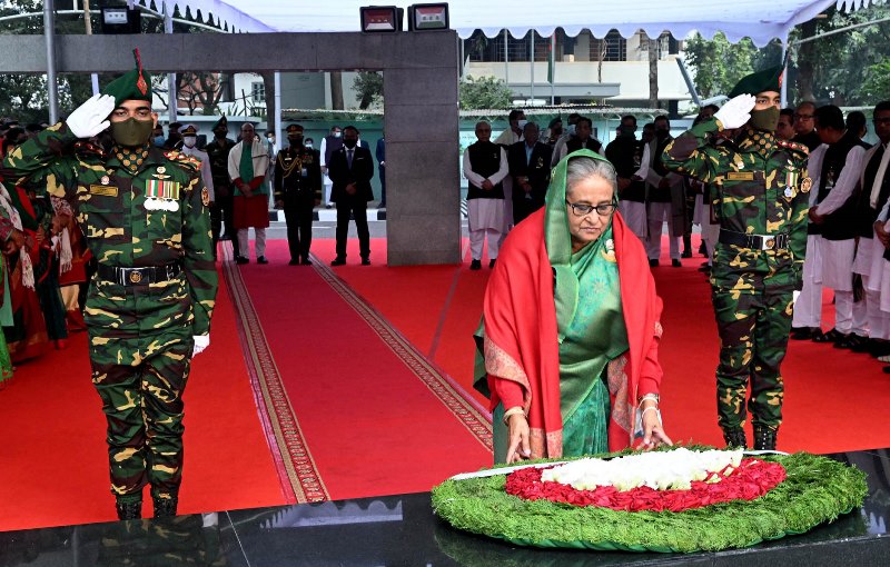 PM pays tribute to Bangabandhu's portrait on Great Victory Day PM pays tribute to Bangabandhu's portrait on Great Victory Day