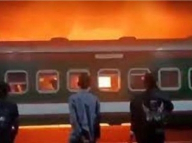 Miscreants torch standing train in Tangail