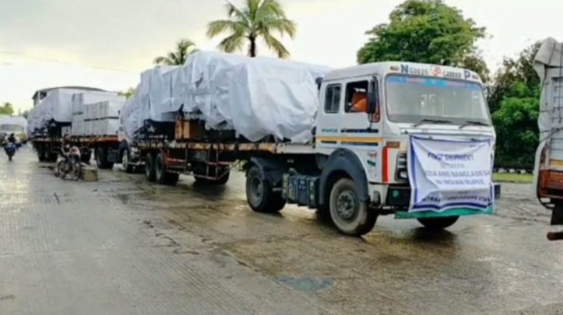 The first consignment of vehicles bought using Indian Rupee arrives via Benapole