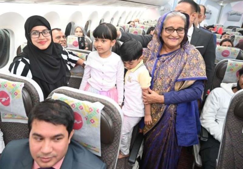 Prime Minister exchanged pleasantries with Biman passengers