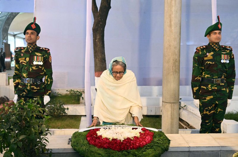 Sheikh Hasina pays tribute to Bangabandhu's portrait after winning polls